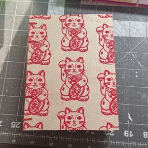 Available now! Red Lucky Cat blank journal. Hand Sewn Notebook Made in Alaska